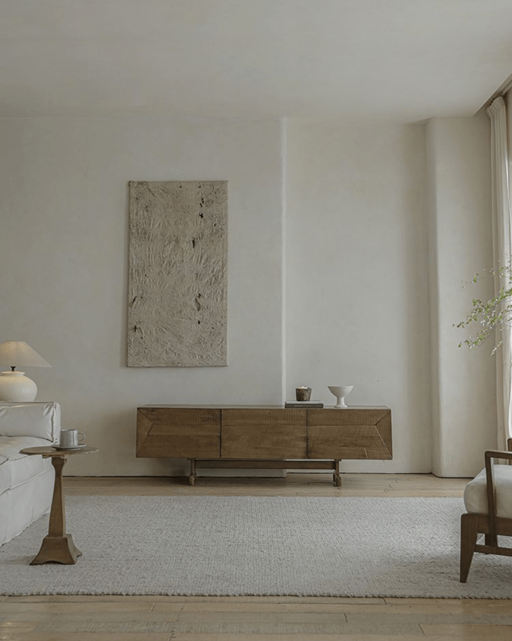 No.3 Sideboard in reclaimed wood, modern design with geometric panels in a room setting with neutral tones and clean lines
