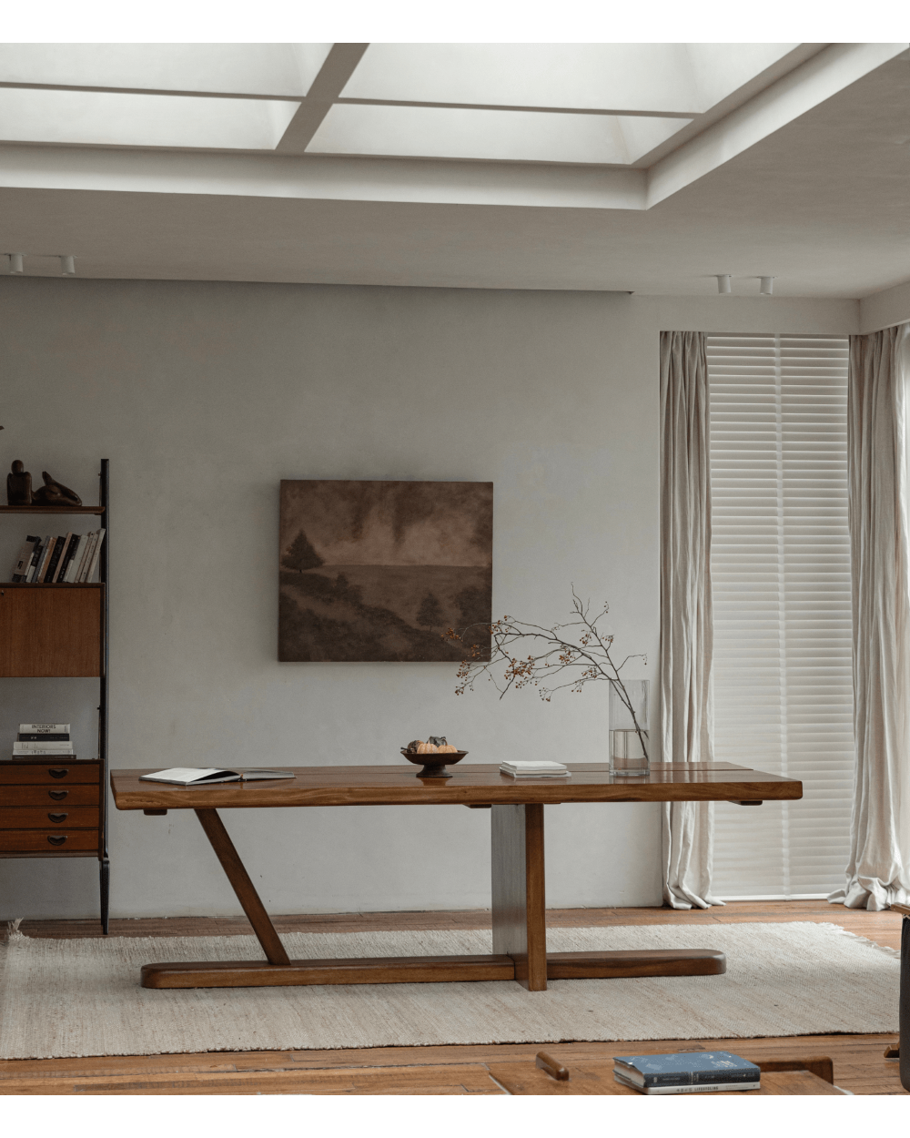 Sailboat Desk in modern interior, solid wood desk with Z-shaped leg design, natural light