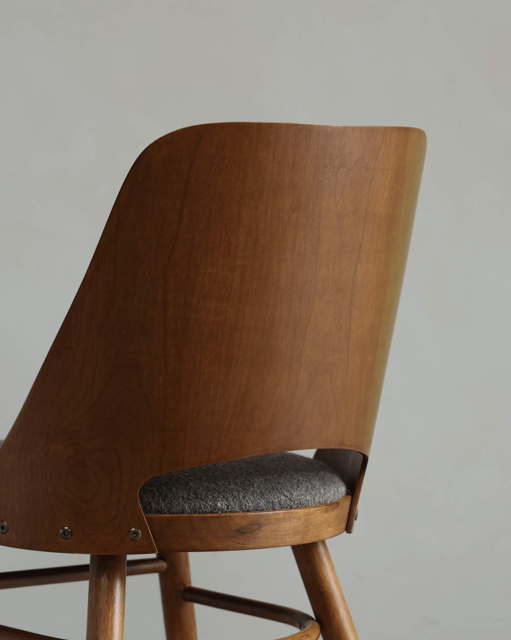Shell Chair backrest: Teak wood frame with gray loop fabric seat, mid-century modern design