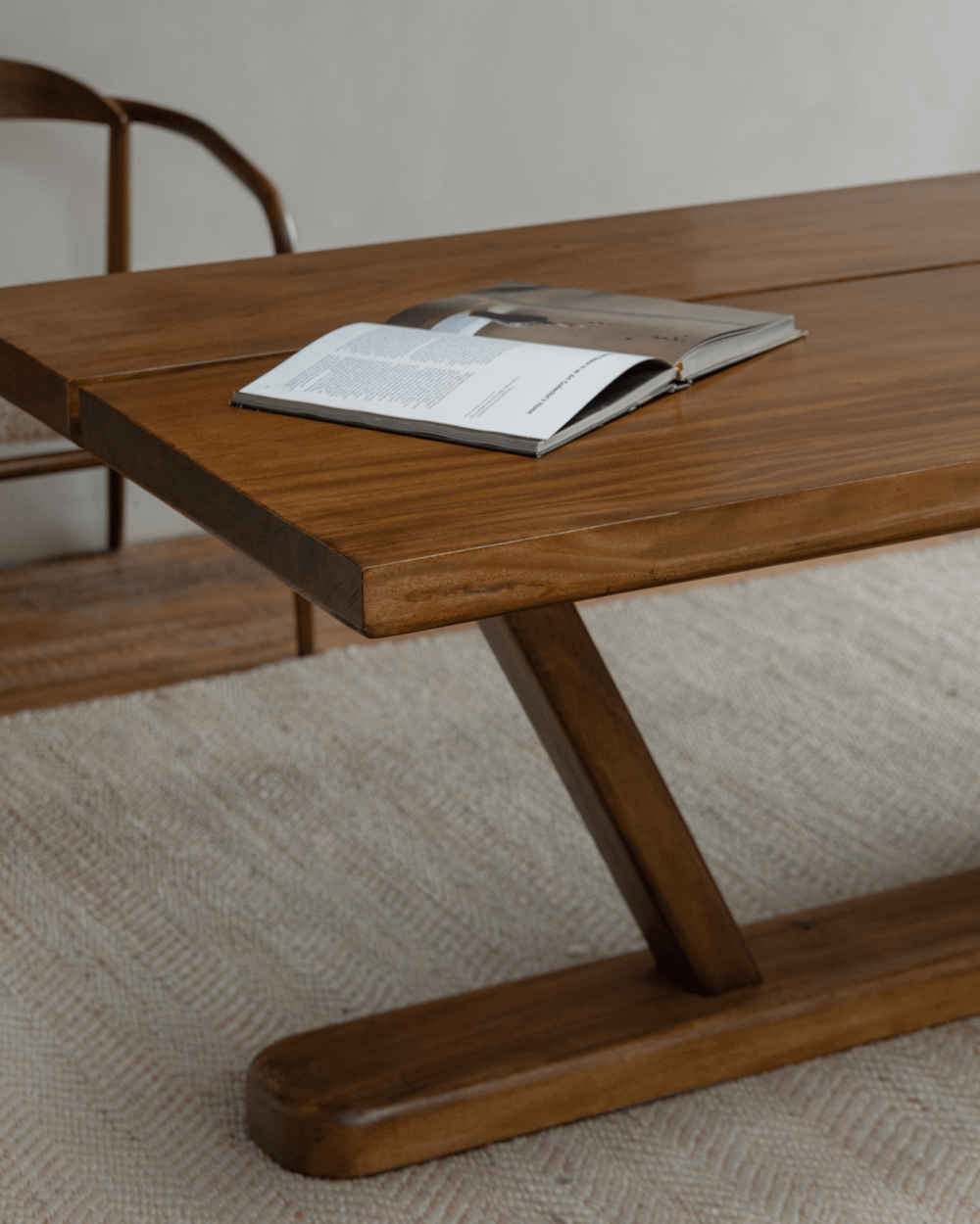 Sailboat desk solid wood surface with a book, modern design, elegant craftsmanship