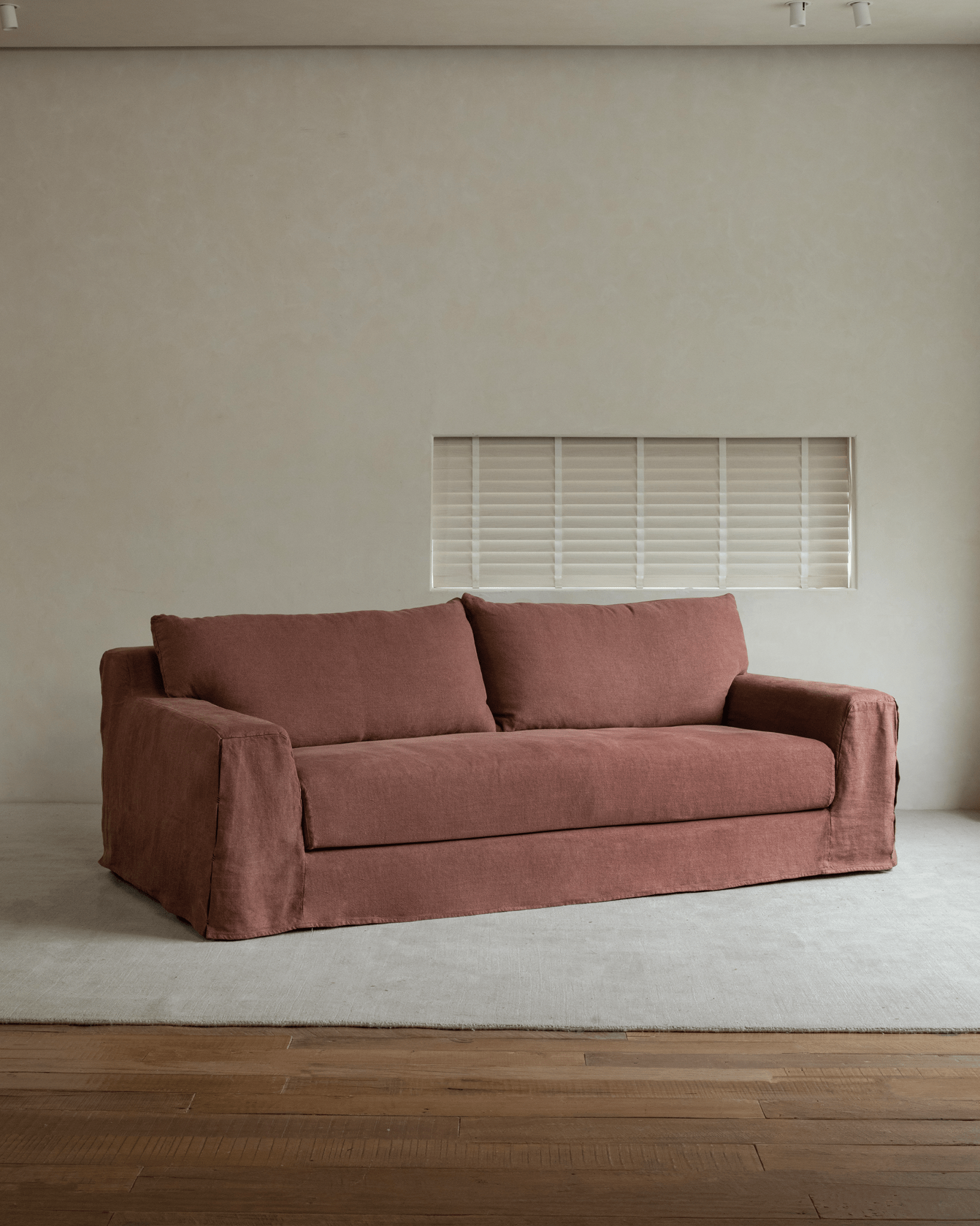 Guni Linen Sofa in terracotta, featuring linen fabric and triple filling, perfect for relaxed and spacious living.