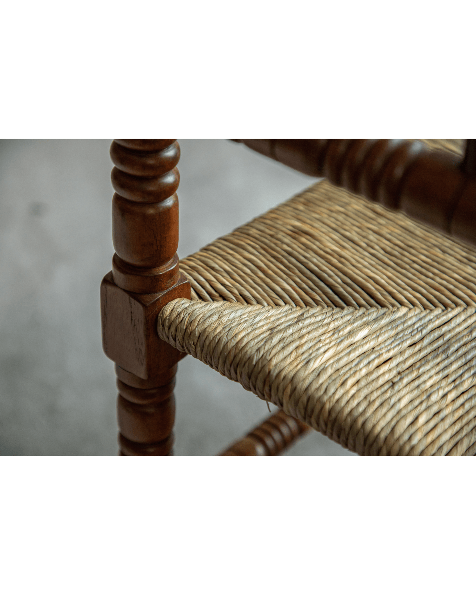 Bobbin Corner Chair detail: Woven grass rope seat and wooden frame, French Vintage style
