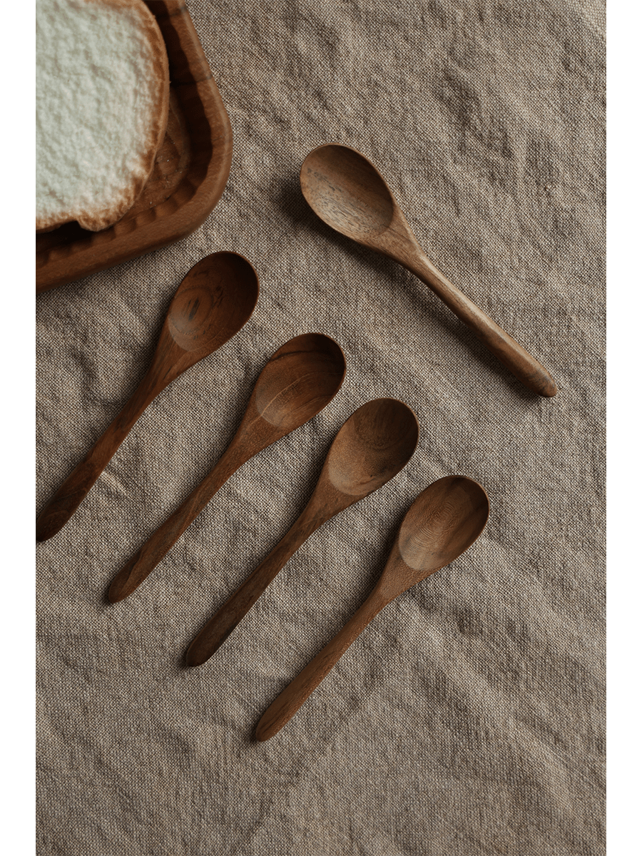 Set of five wooden table spoons on beige linen. Natural wood finish, product shot. Table Spoon*4PCS.