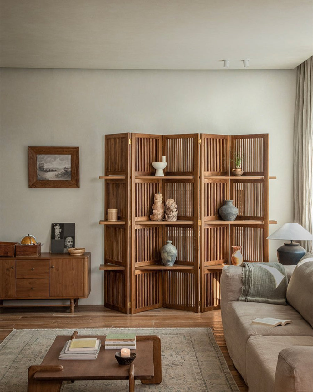 Sylvan Room Divider: folding teak wood screen with slatted panels and shelves.