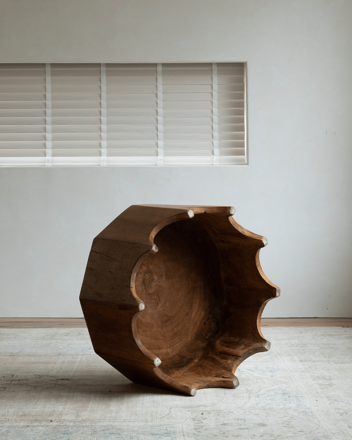 Decagon side table in solid rainwood, ten-sided geometric design, showcasing craftsmanship and wood grain