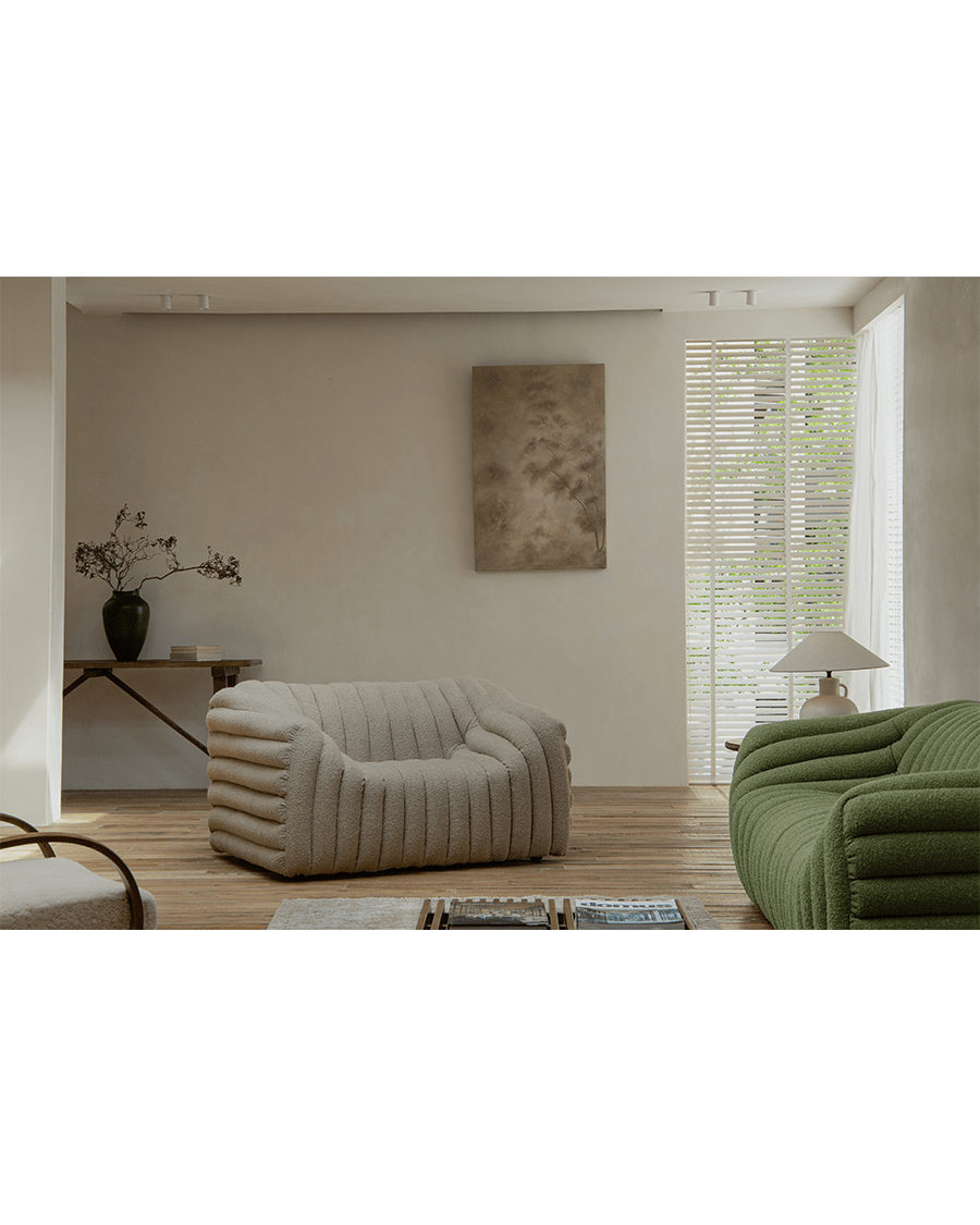 Miche Sofa in beige and green with vertical ribbed design, cozy living room setting, soft and comfortable
