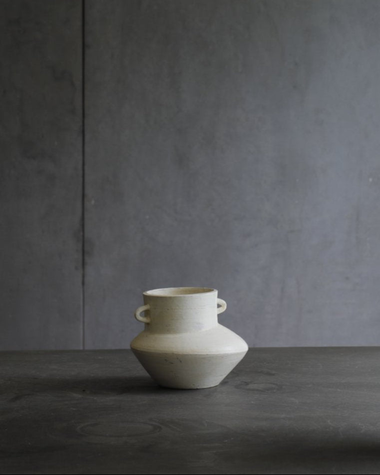 Off-white ceramic vase with handles, minimalist home decor