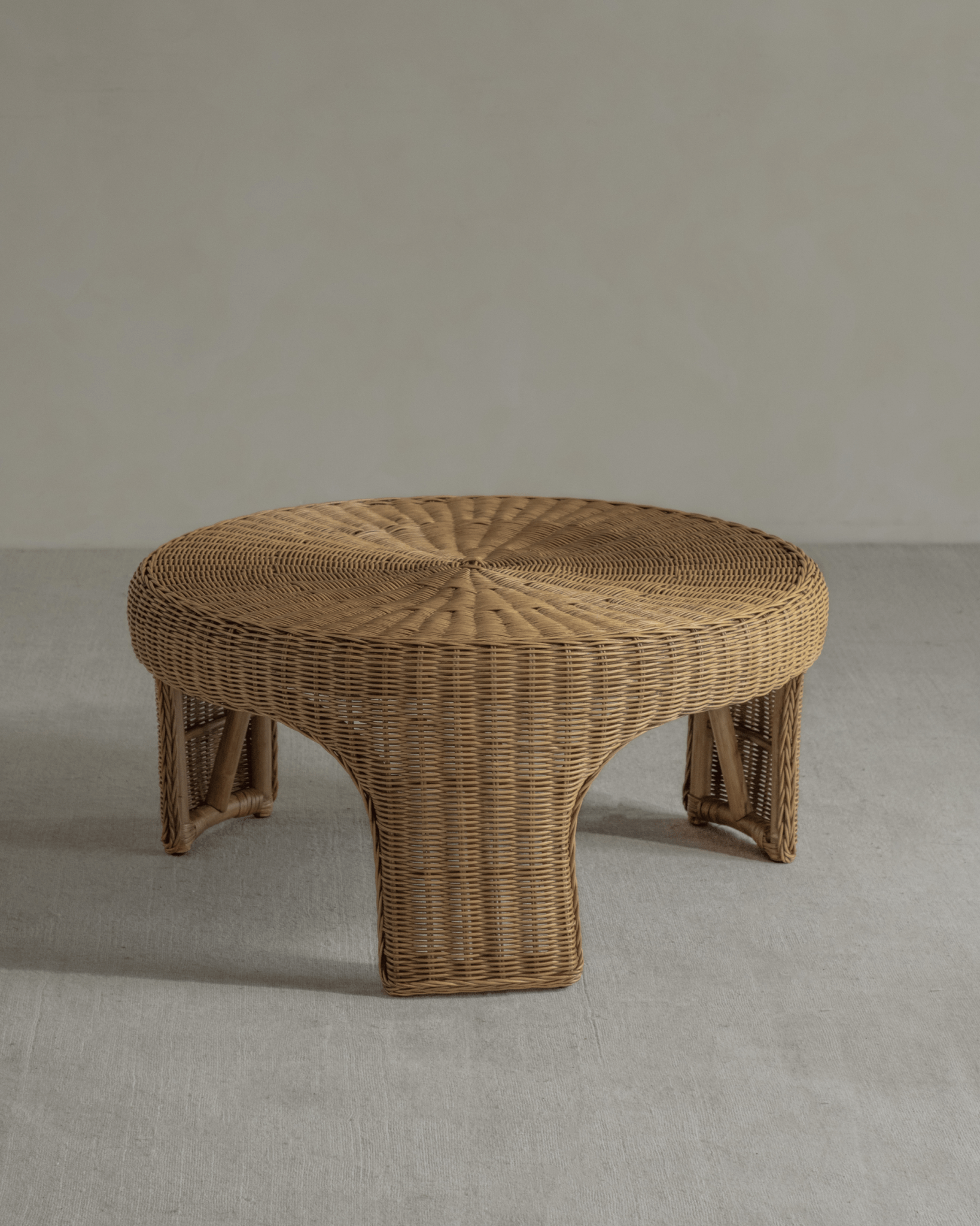 Lotus Tatami Set - Handwoven rattan tea table with rounded design.