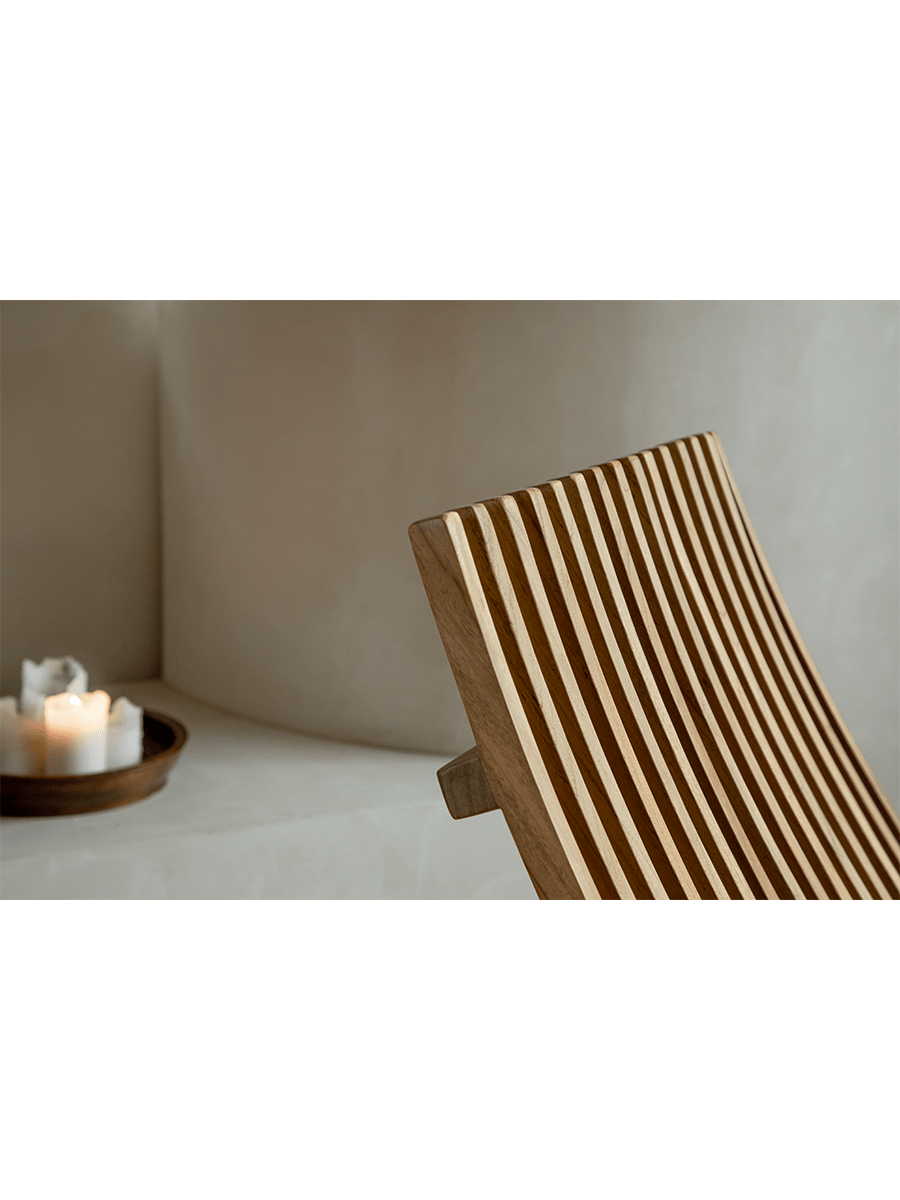 Oly Lounge Chair - Wooden slatted backrest design, ergonomic and stylish seating for comfortable relaxation.