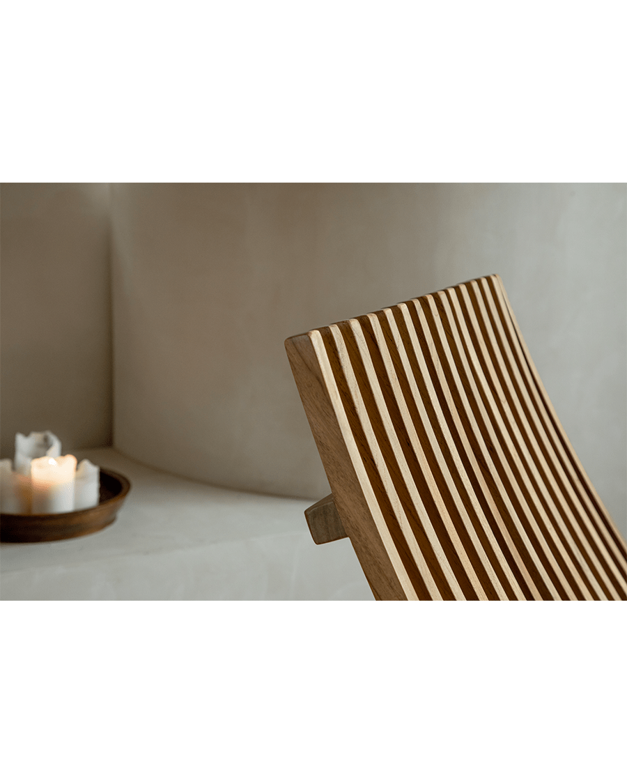 Oly Lounge Chair - Wooden slatted backrest design, ergonomic and stylish seating for comfortable relaxation.