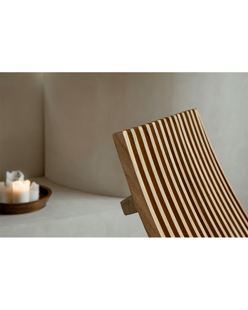 Oly Lounge Chair - Wooden slatted backrest design, ergonomic and stylish seating for comfortable relaxation.