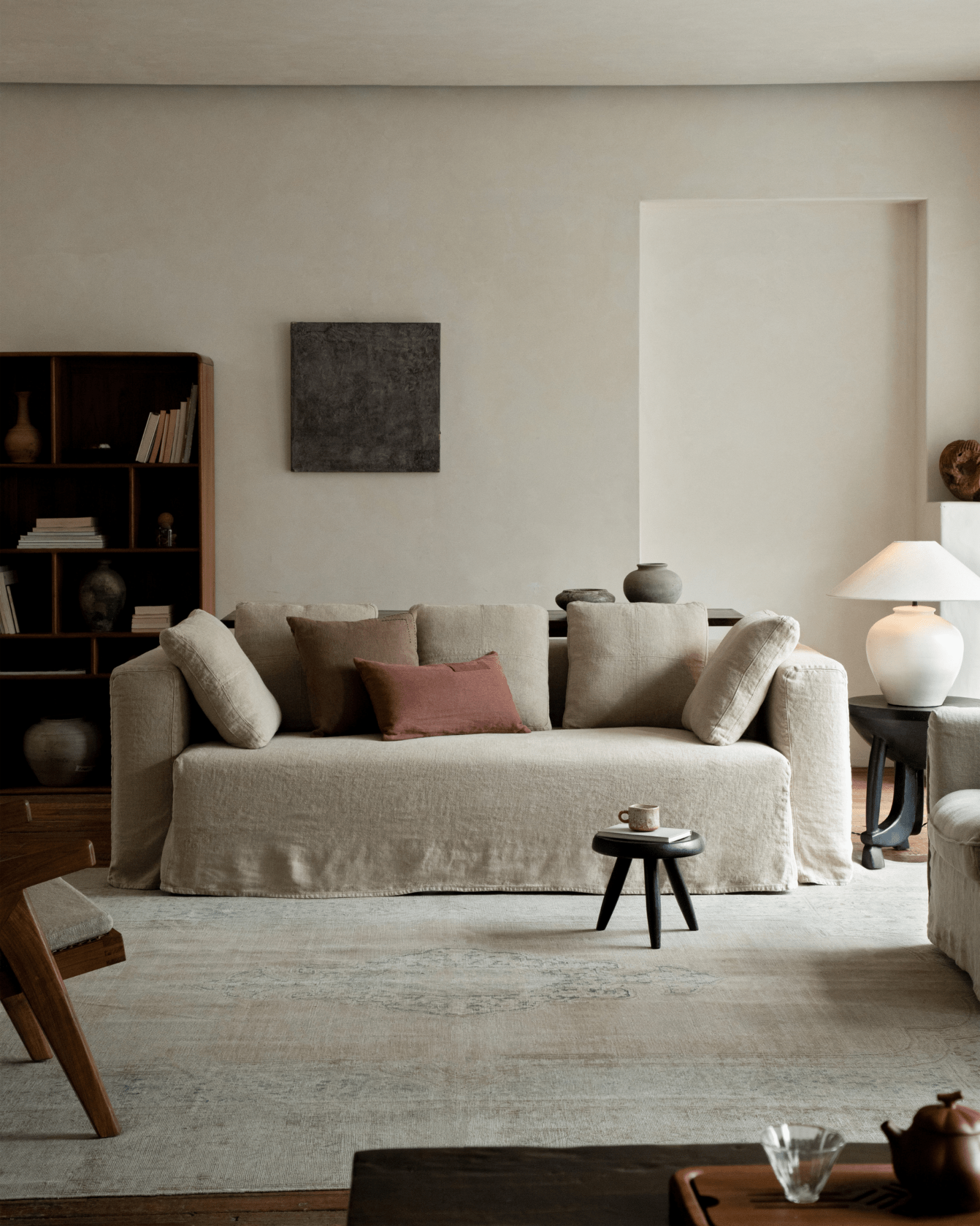 Nola Sofa in natural linen, showcasing a comfortable and stylish design with soft cushions, perfect for a living room setup