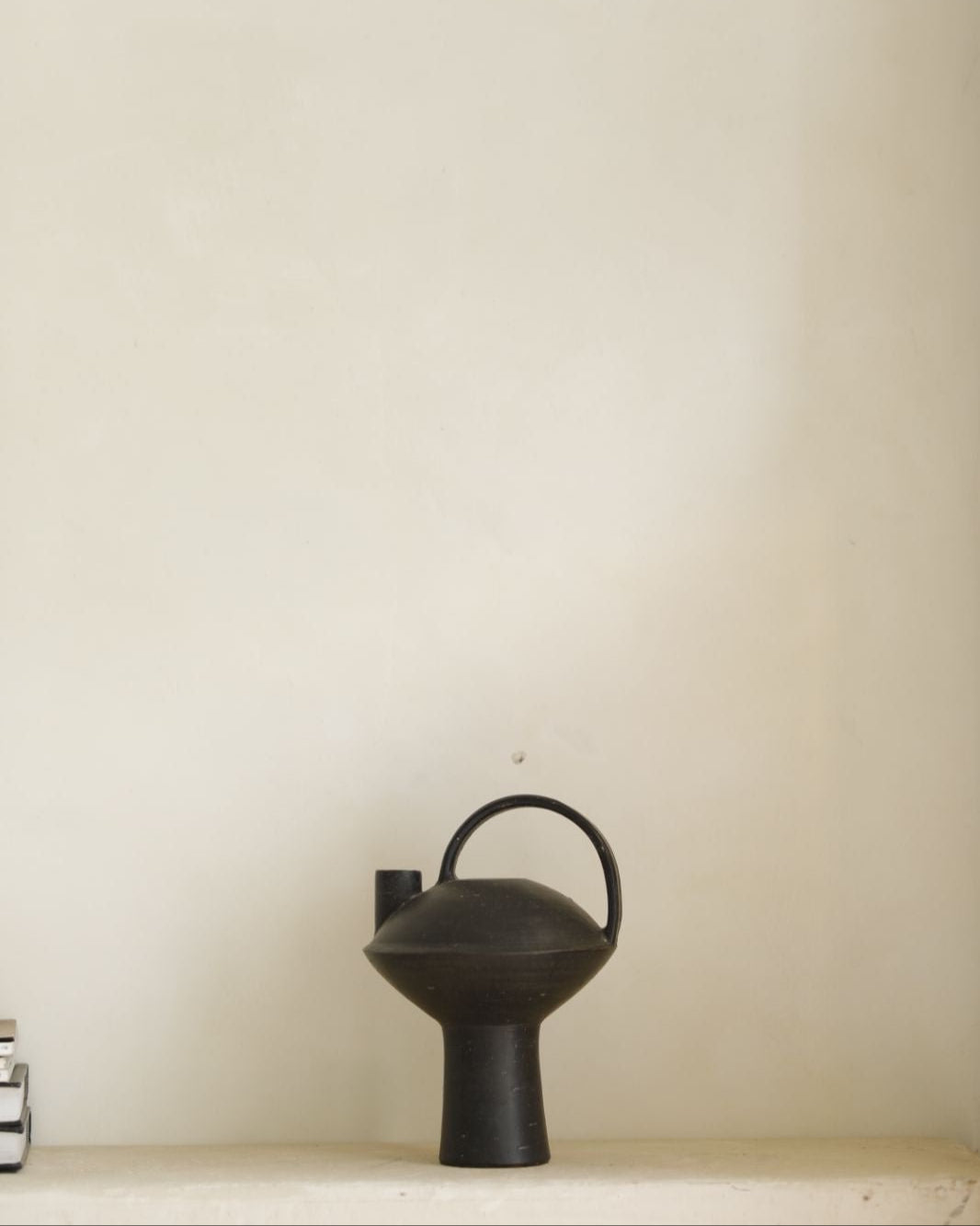 Black ceramic vase with handle, for home decor, minimalist design