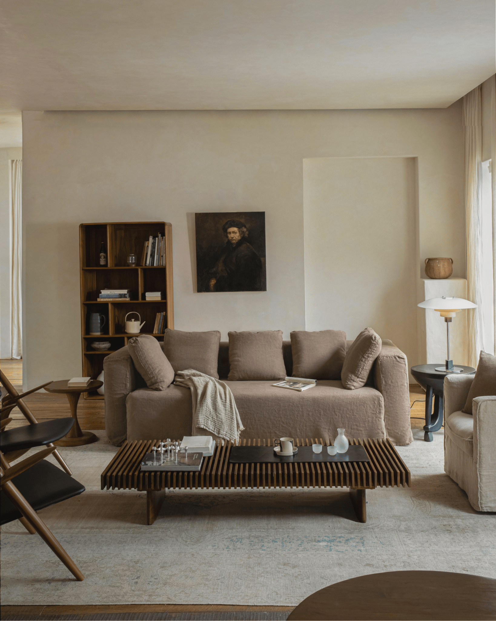 Nola Sofa in Natural Flax, showcased in a stylish, comfortable living room setting with wooden accents.