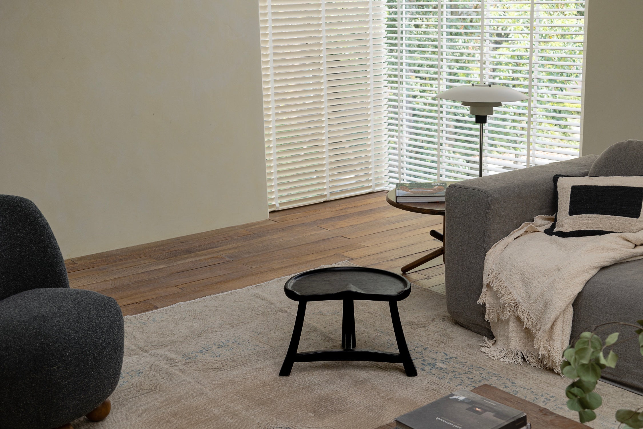 Black Pod Stool: teak wood side table with vintage design, curved seat.