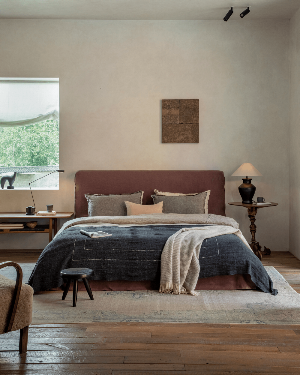 Freya Linen Bed in a serene bedroom with natural linen bedding, wooden furniture, and cozy atmosphere