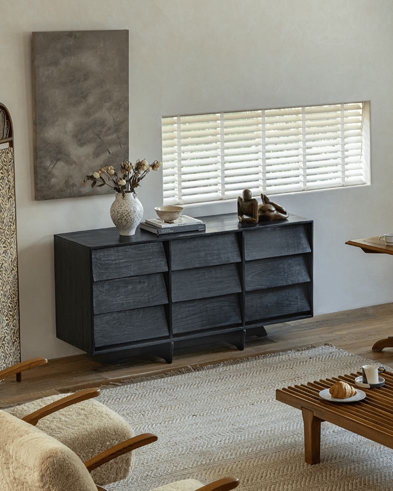 NO.9 Sideboard in minimalist living room, featuring dark reclaimed wood, nine drawers, and handleless design.