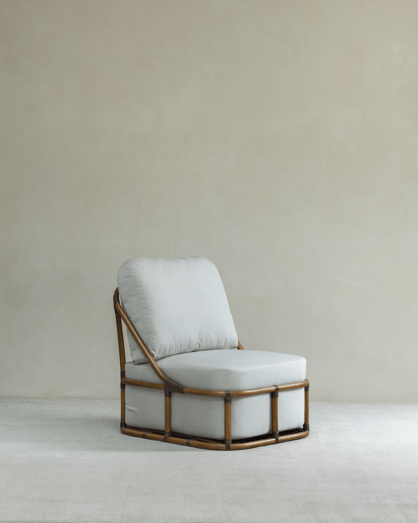 Tofu Lounge Sofa: Rattan frame with spacious seating and a detachable, washable cushion for comfort.