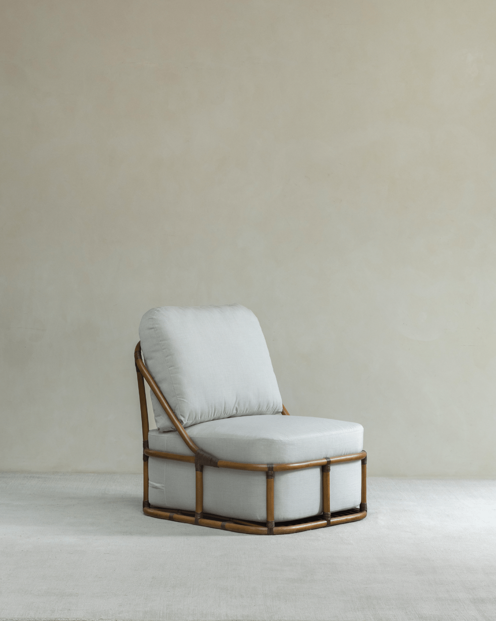 Tofu Lounge Sofa: Rattan frame with spacious seating and a detachable, washable cushion for comfort.