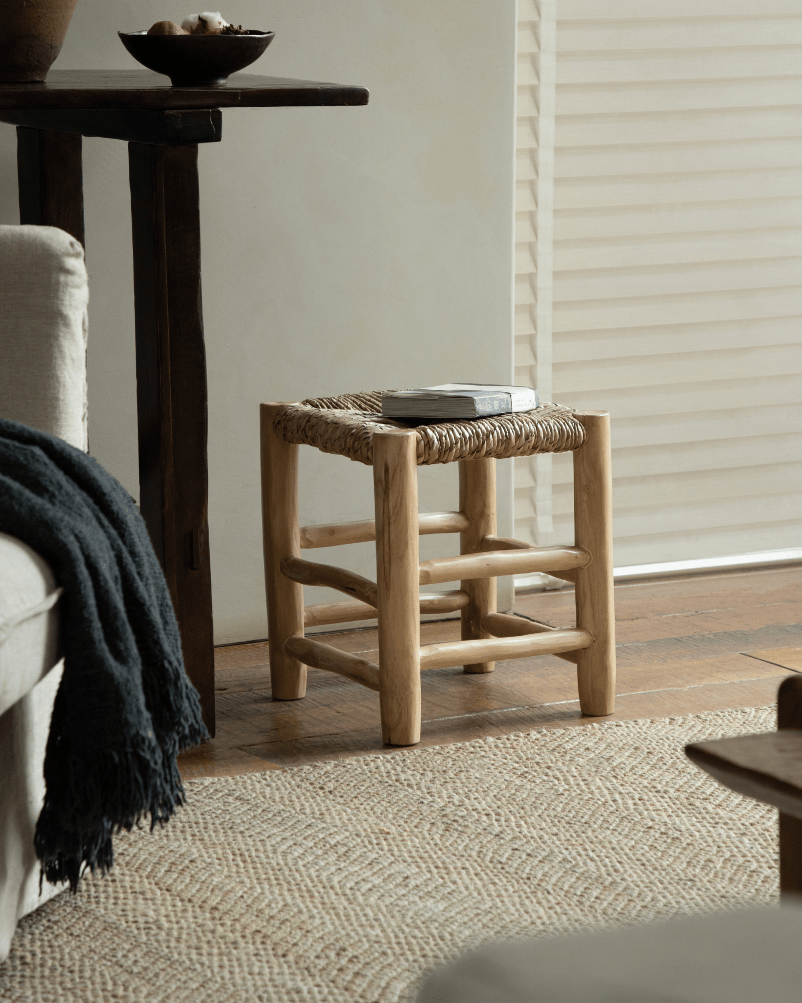 Isla Handwoven Stool with natural wood frame and woven pandan seat. Modern organic design, perfect for living room.