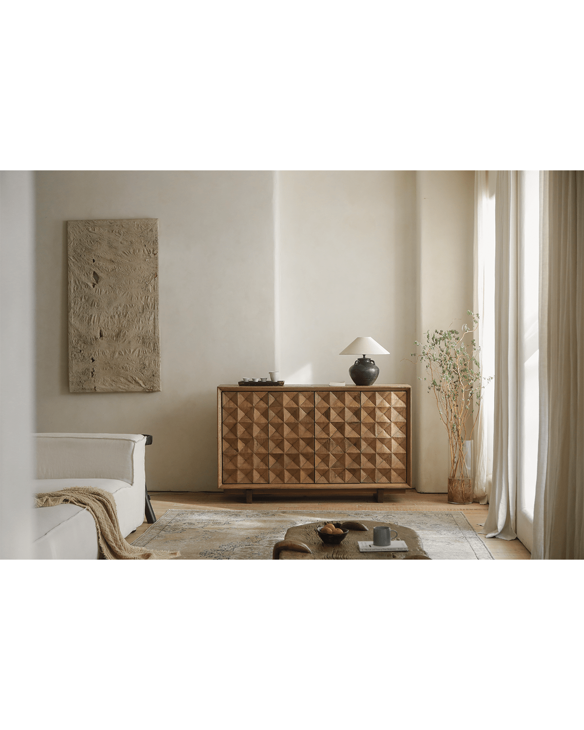 Bumpy Sideboard in reclaimed wood with geometric design, styled in a modern living room setting.