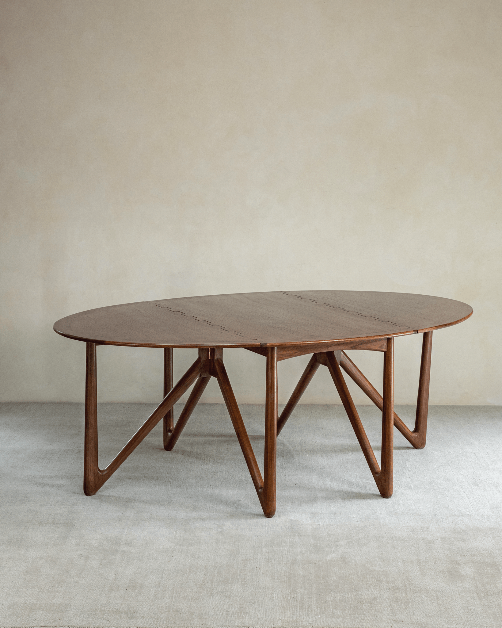 Niels Folding Table extended, Burmese teak wood with V-shaped legs, mid-century modern design