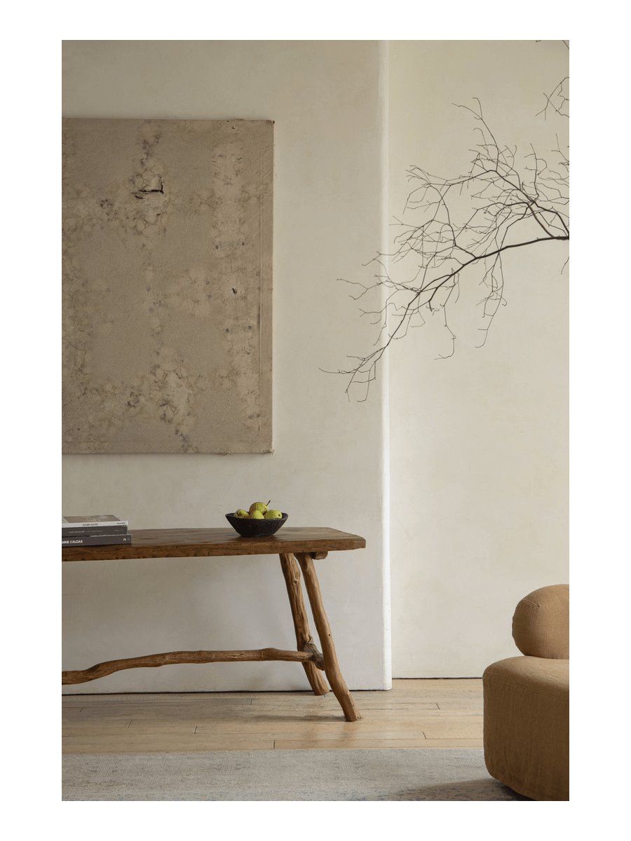 Branch Console Table in rustic interior, natural wood grain, organic design with fruit and decor