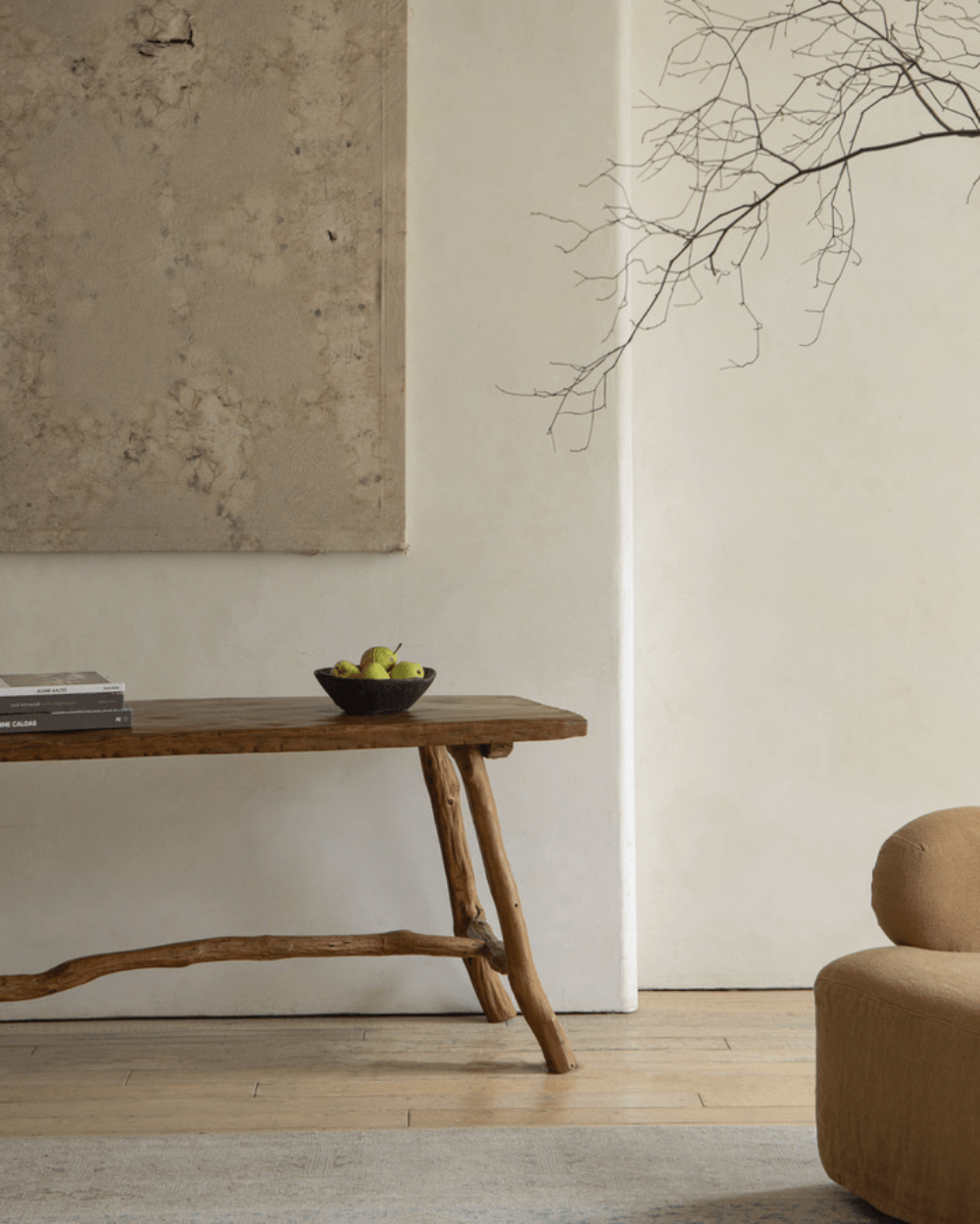Branch Console Table in rustic interior, natural wood grain, organic design with fruit and decor