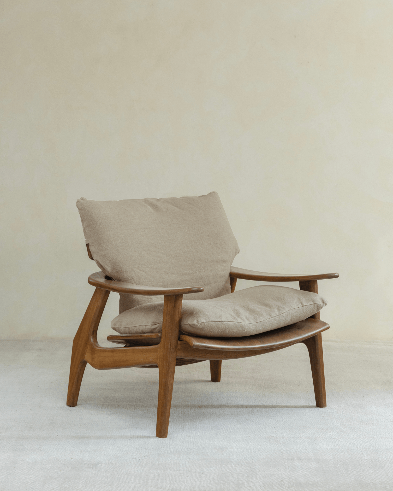 Zen Armchair - Light brown wooden frame with beige linen cushions, ergonomic design for relaxation.