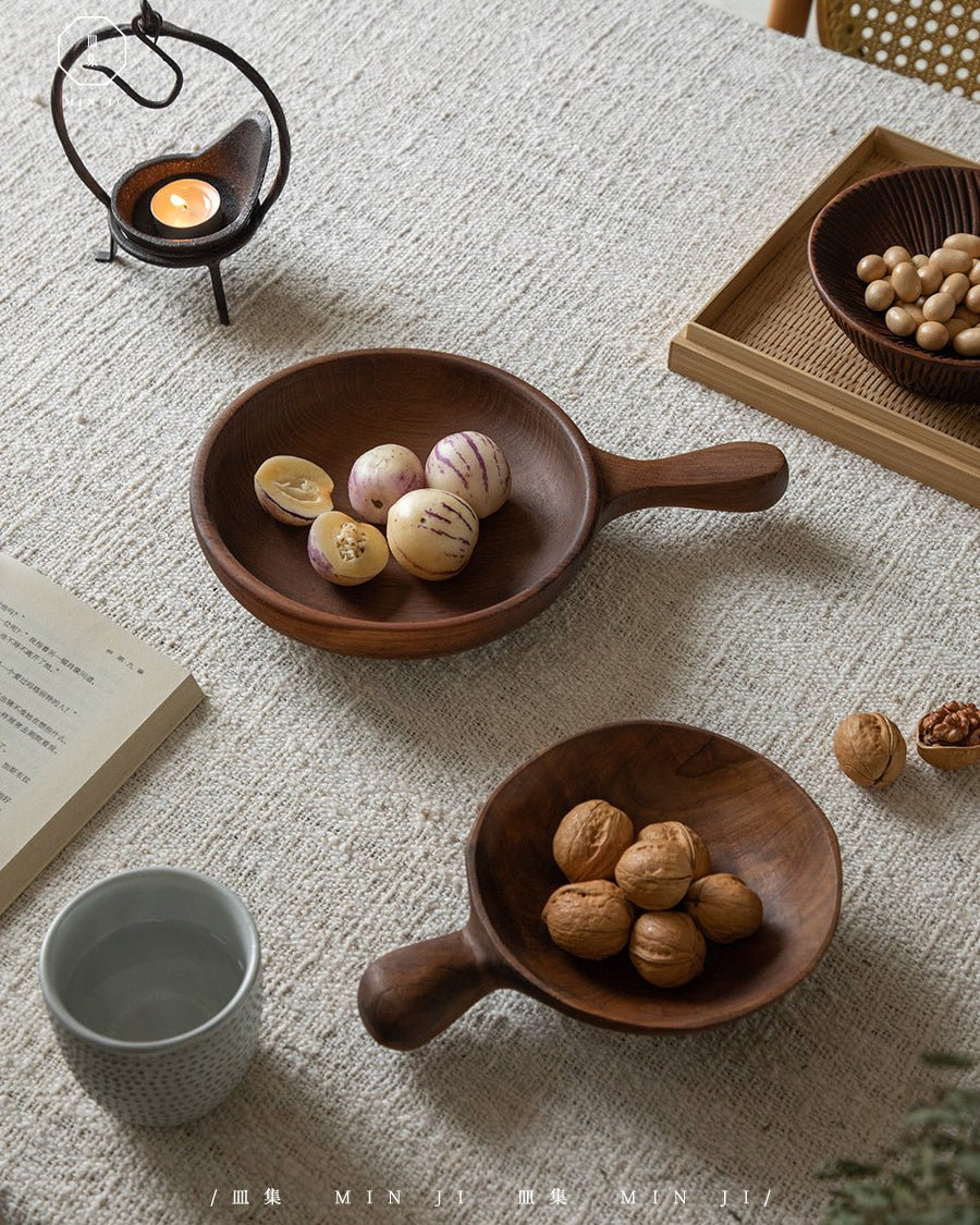 Fany Tray in teak wood, serving pepino melons and walnuts. Rustic wooden serving dishes.