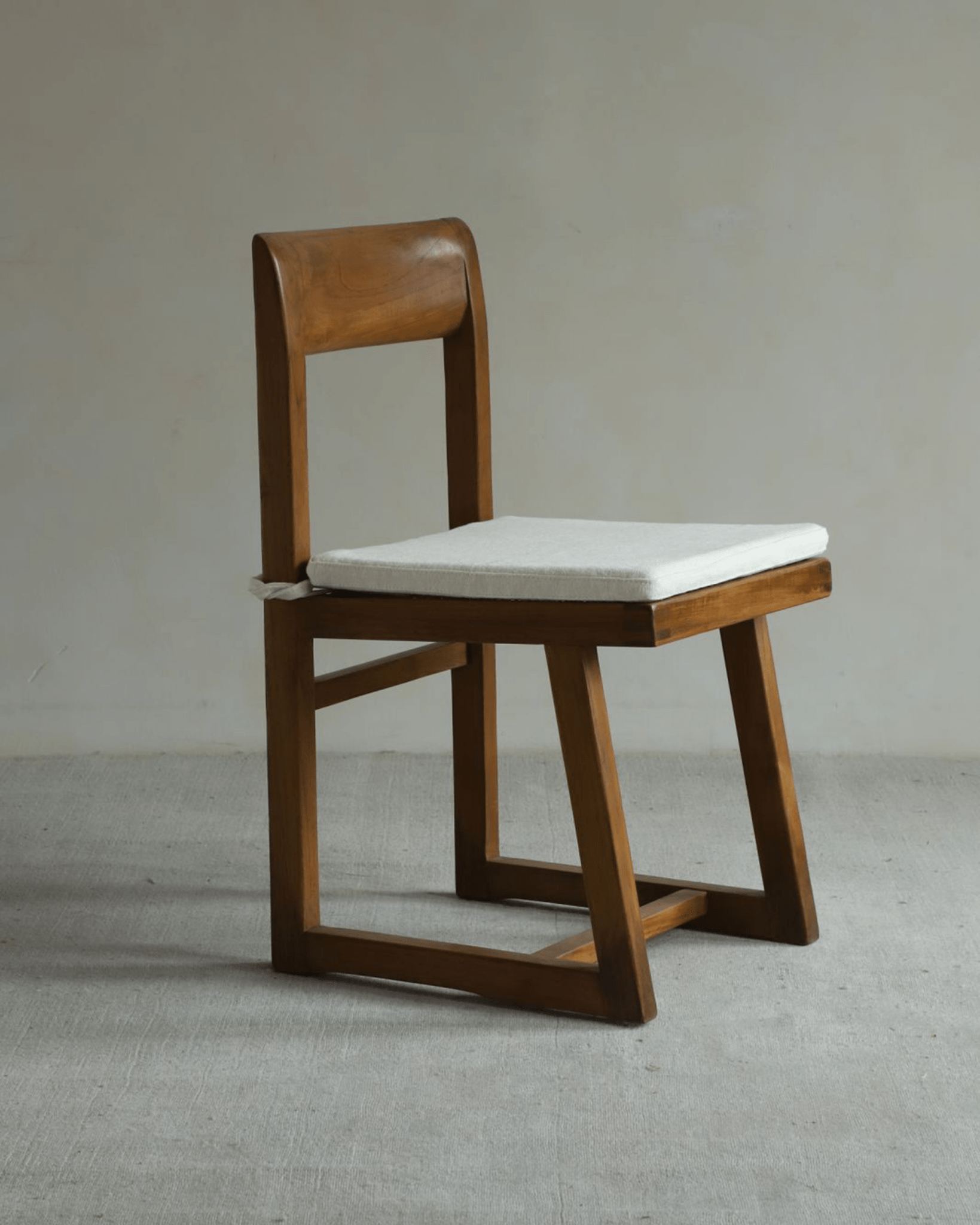 Chandigarh Box Chair - Wooden frame with white fabric seat cushion. Mid-Century Modern design