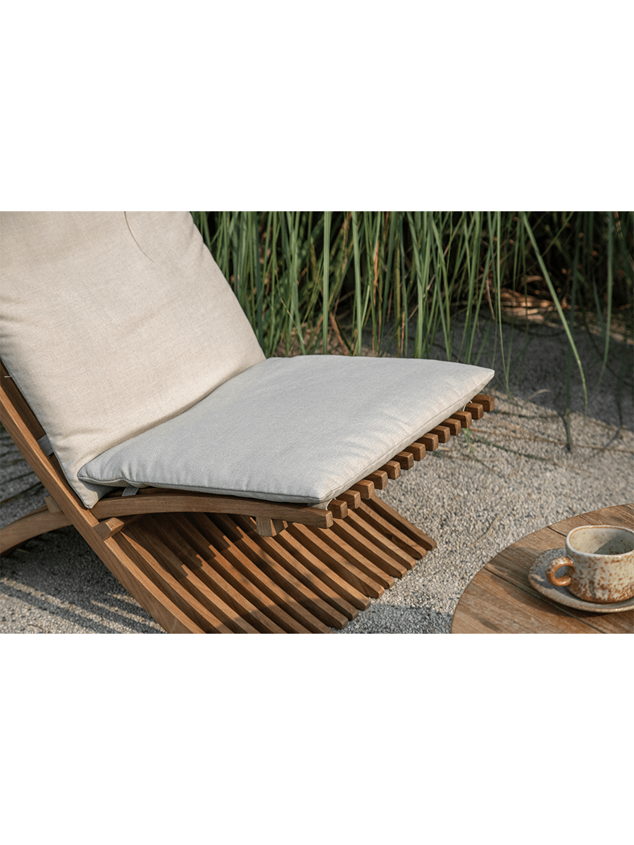 Oly Lounge Chair with cream cushion, wooden slatted design, ideal for outdoor relaxation and comfort