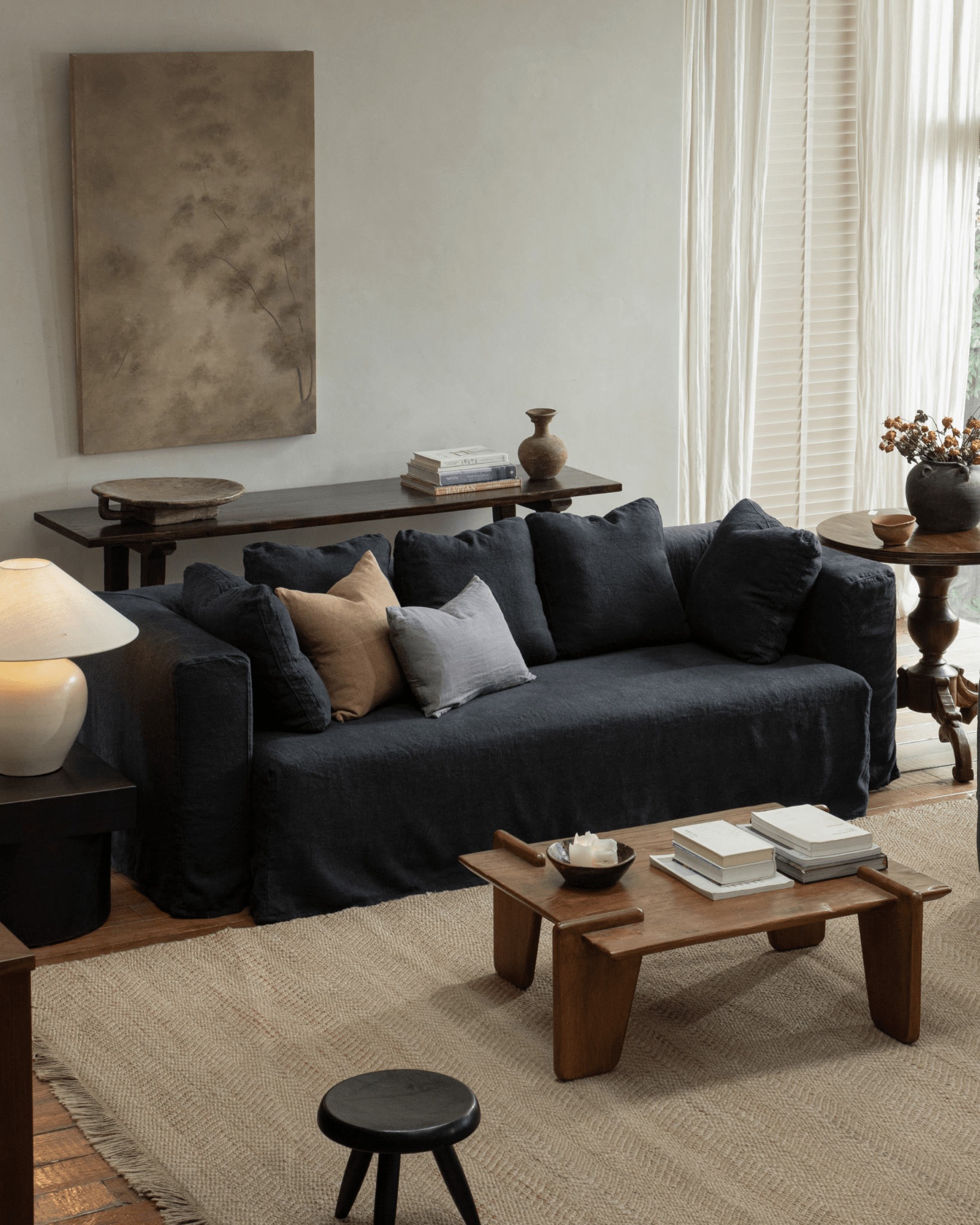 Nola Sofa in Shadow Blue linen, stylish living room design with wooden accents and comfortable cushions