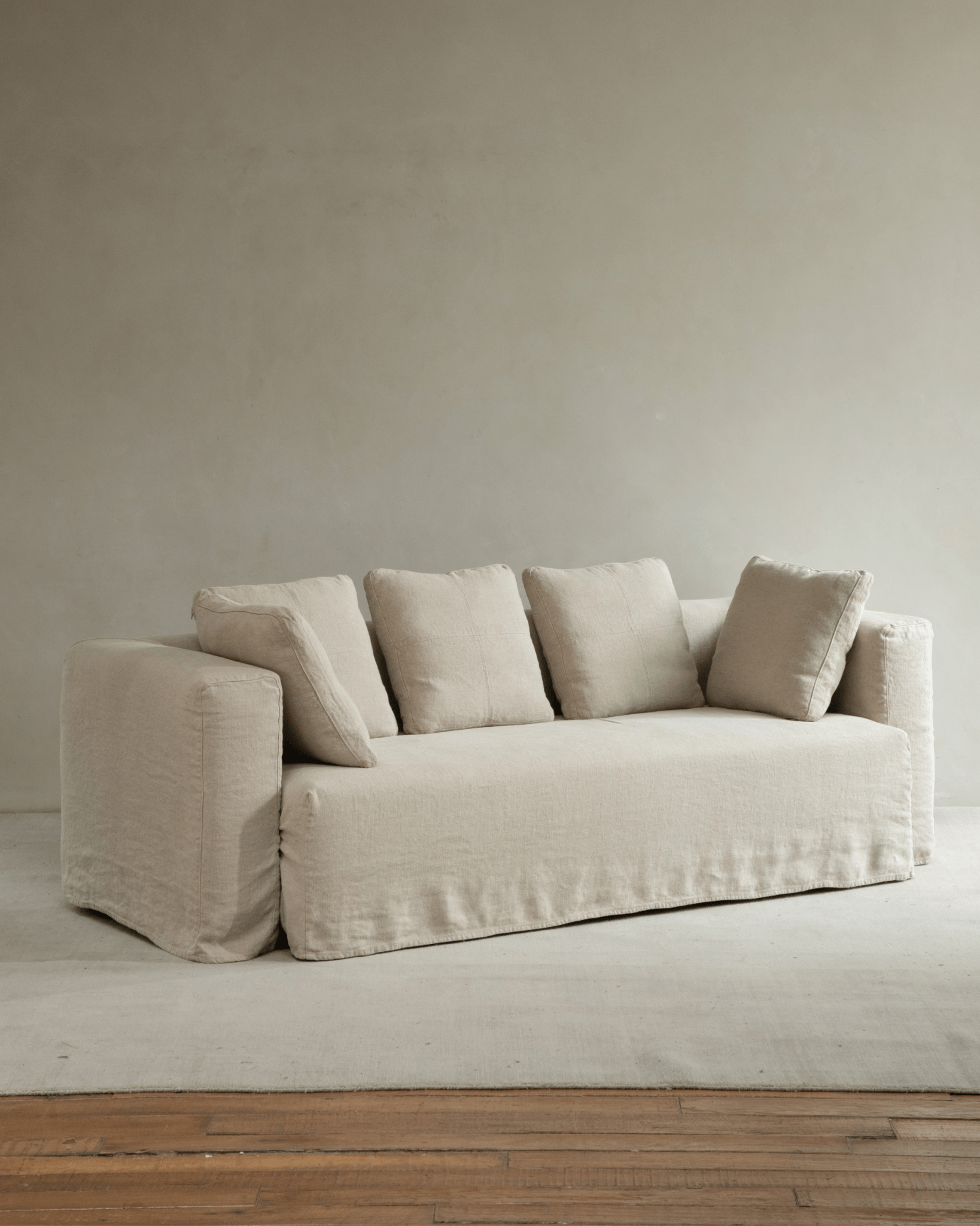 Nola Sofa in natural linen, showcasing soft, breathable fabric and comfortable design