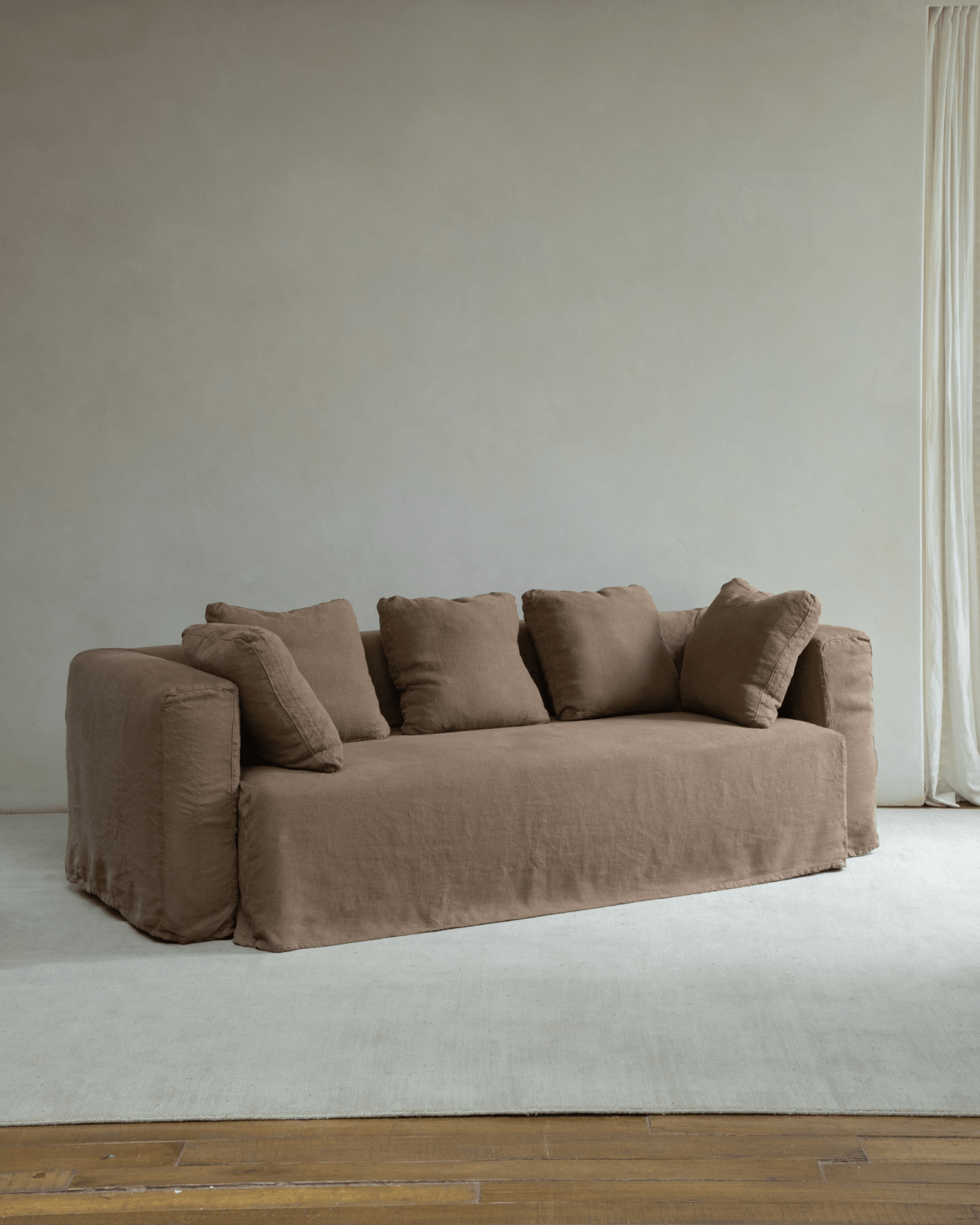 Nola Sofa in Earth Brown linen, showcasing a comfortable and stylish design for living room.