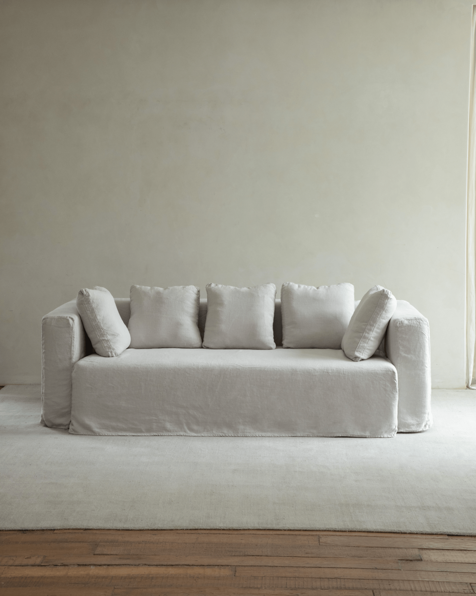 Nola Sofa in Cool Linen, showcasing a comfortable, stylish design in a living room