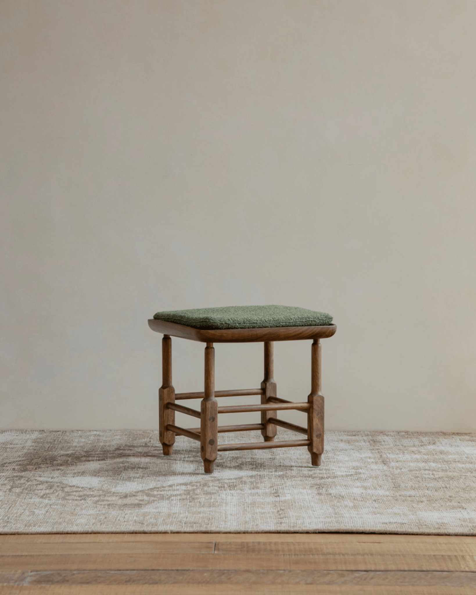 Magrini Stool in zebrawood with green cushion, modern design for interior.