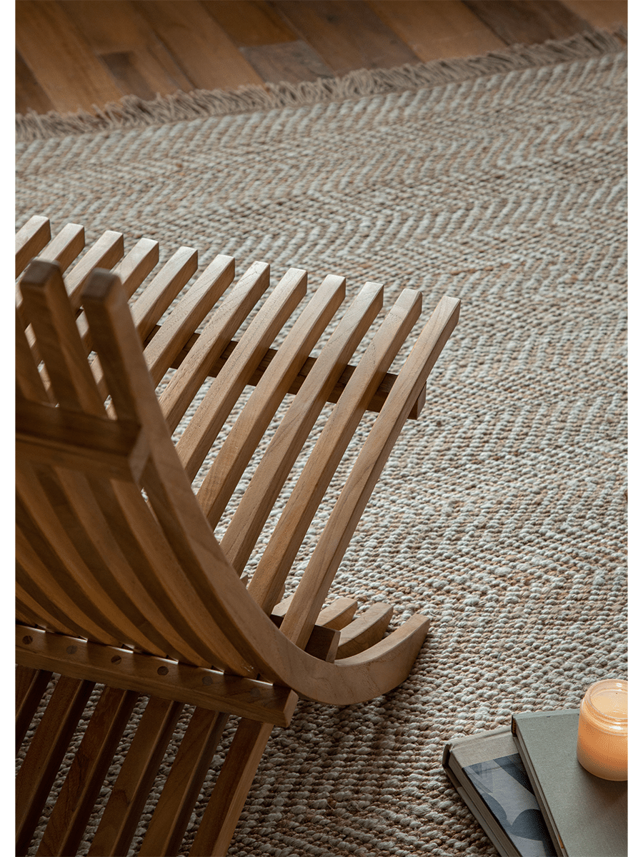 Oly Lounge Chair in wooden slatted design, interior setting, for comfortable relaxation