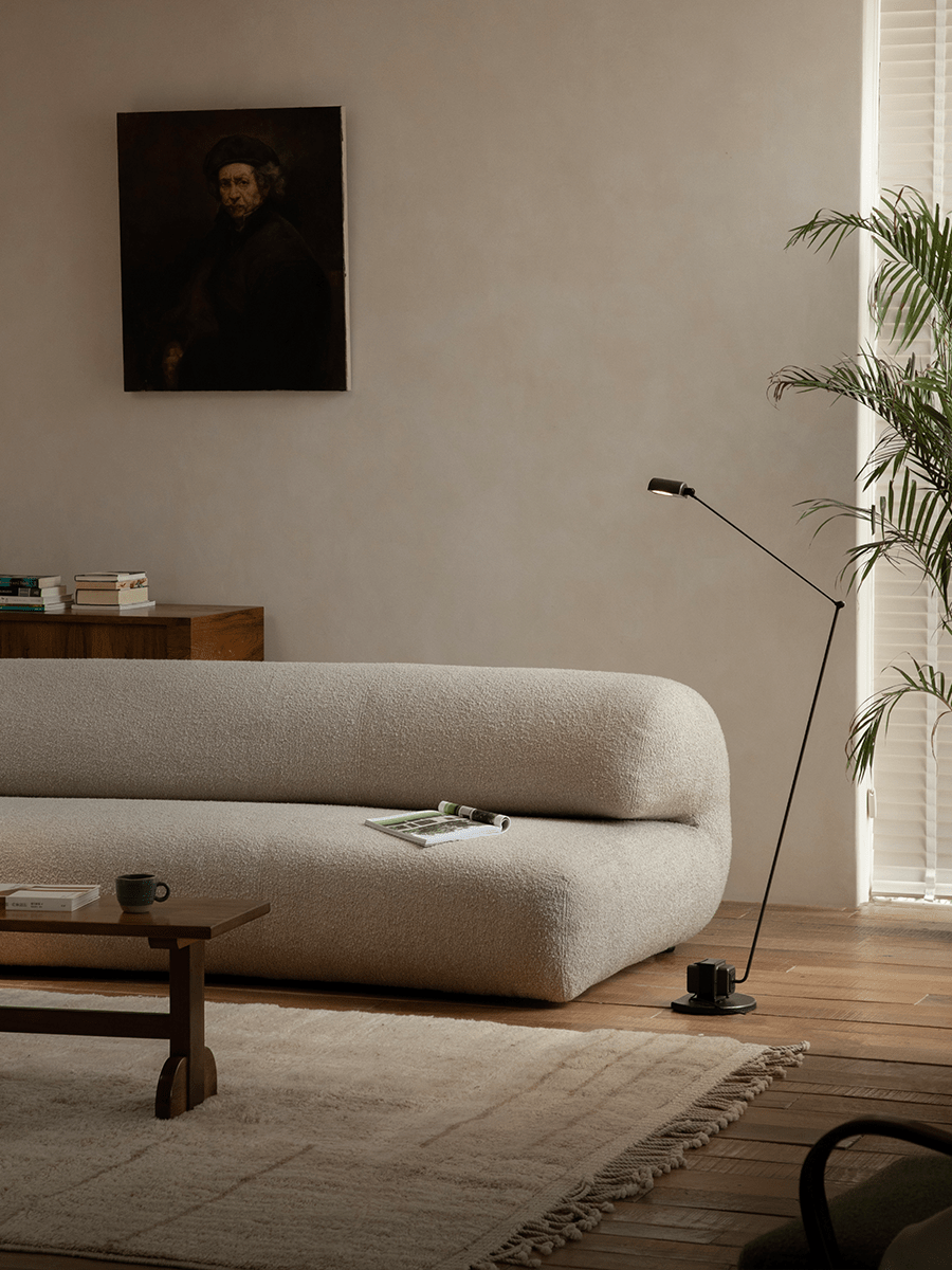 Beige Wave Bouclé Sofa in stylish living room setting. Soft bouclé fabric, modern interior design, and wave design