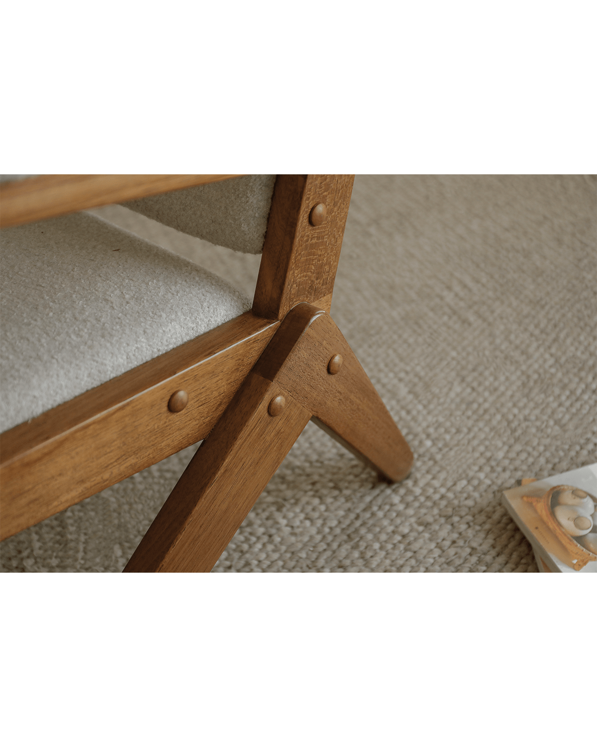Scissors Chair detail: Red oak leg with light grey fabric seat, vintage design and unique scissor legs.