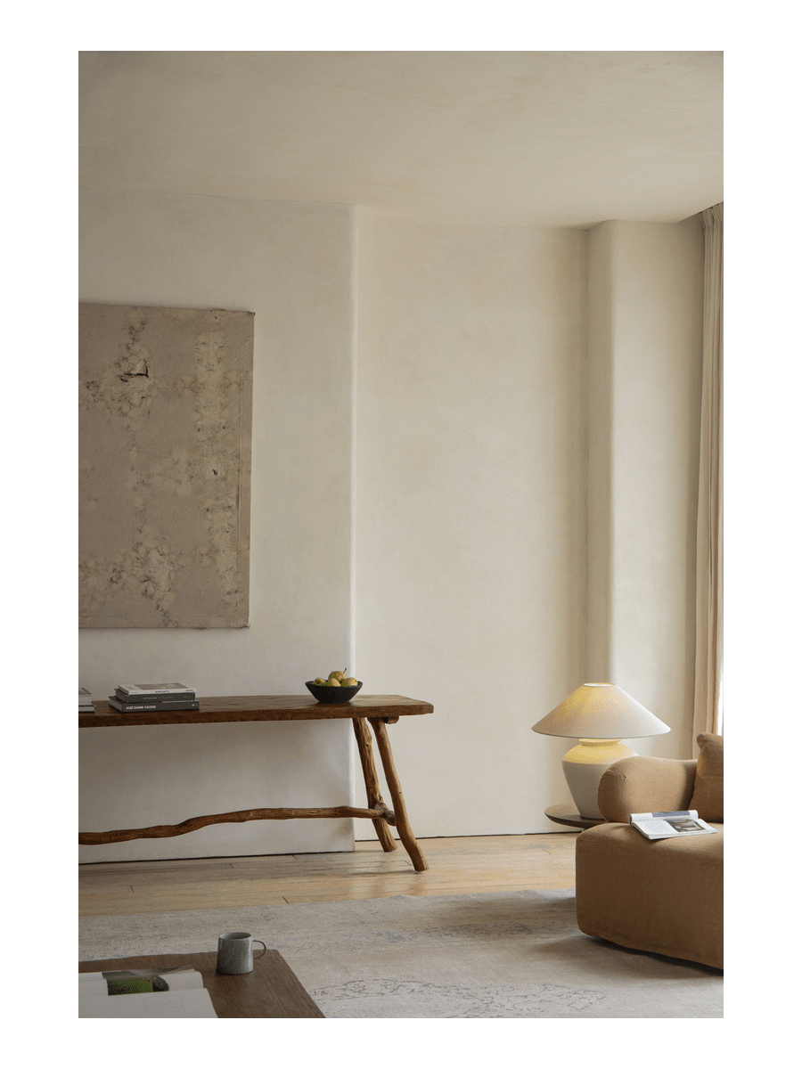 Branch Console Table in rustic setting, natural wood grain, branch legs, and artisanal construction