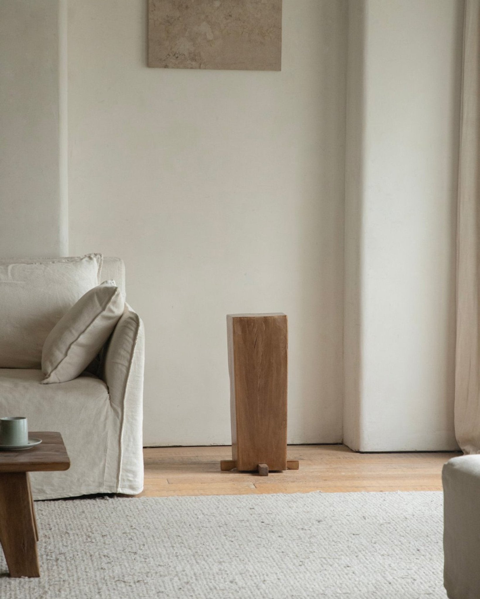 Rustic pedestal, natural wood, organic interior design, aged texture, timeless simplicity, neutral tones
