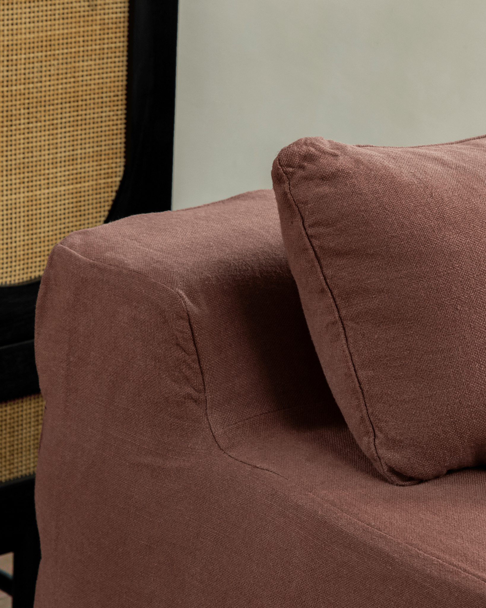 Terracotta Guni Linen Sofa detail, showcasing linen fabric texture and cozy design