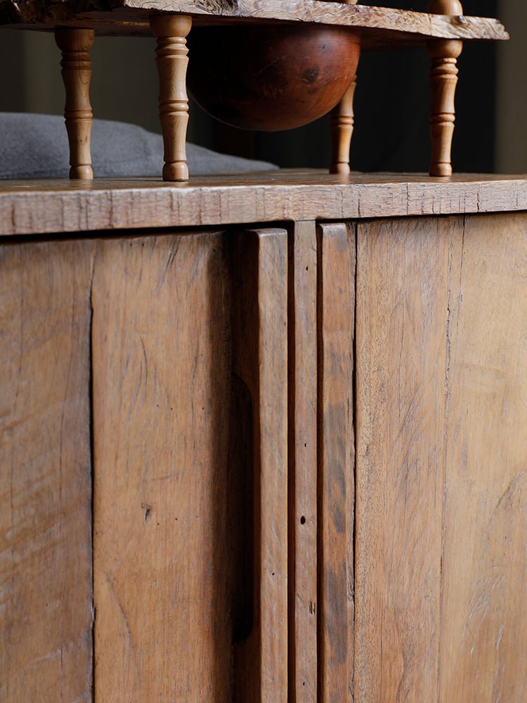 NO.32 Sideboard detail, showing reclaimed wood grain, cabinet doors, rustic design.