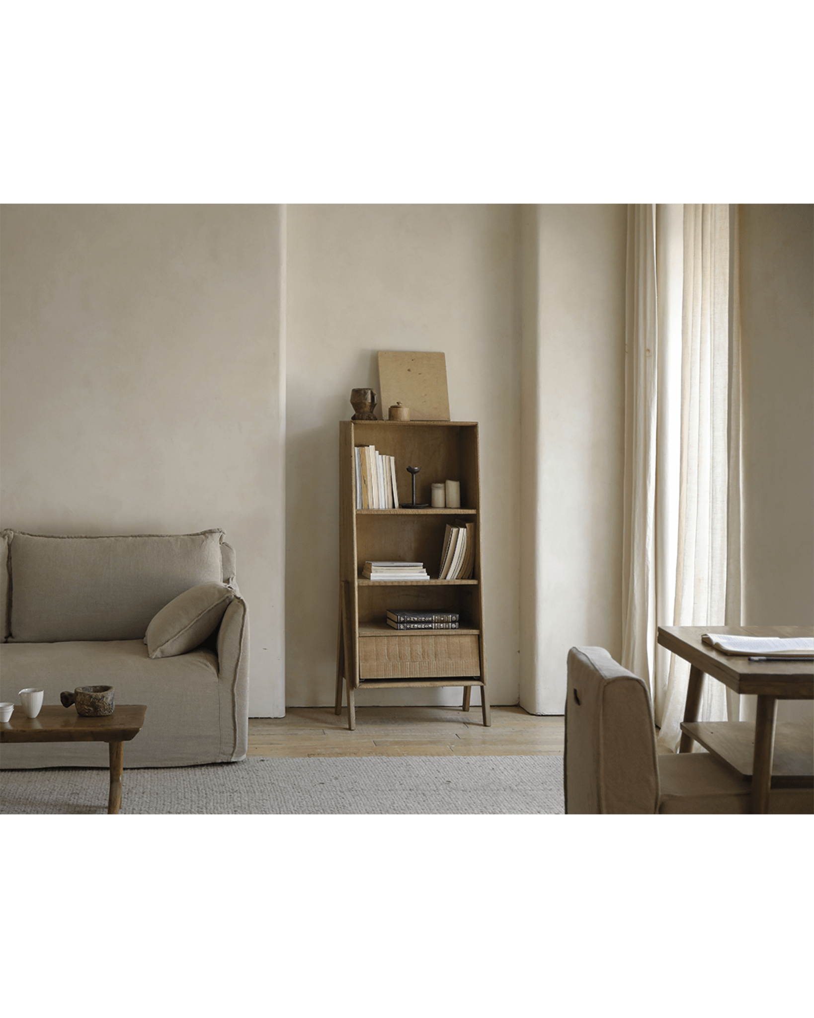 Kin Display Cabinet in a rustic living room setting, showcasing modern design and storage