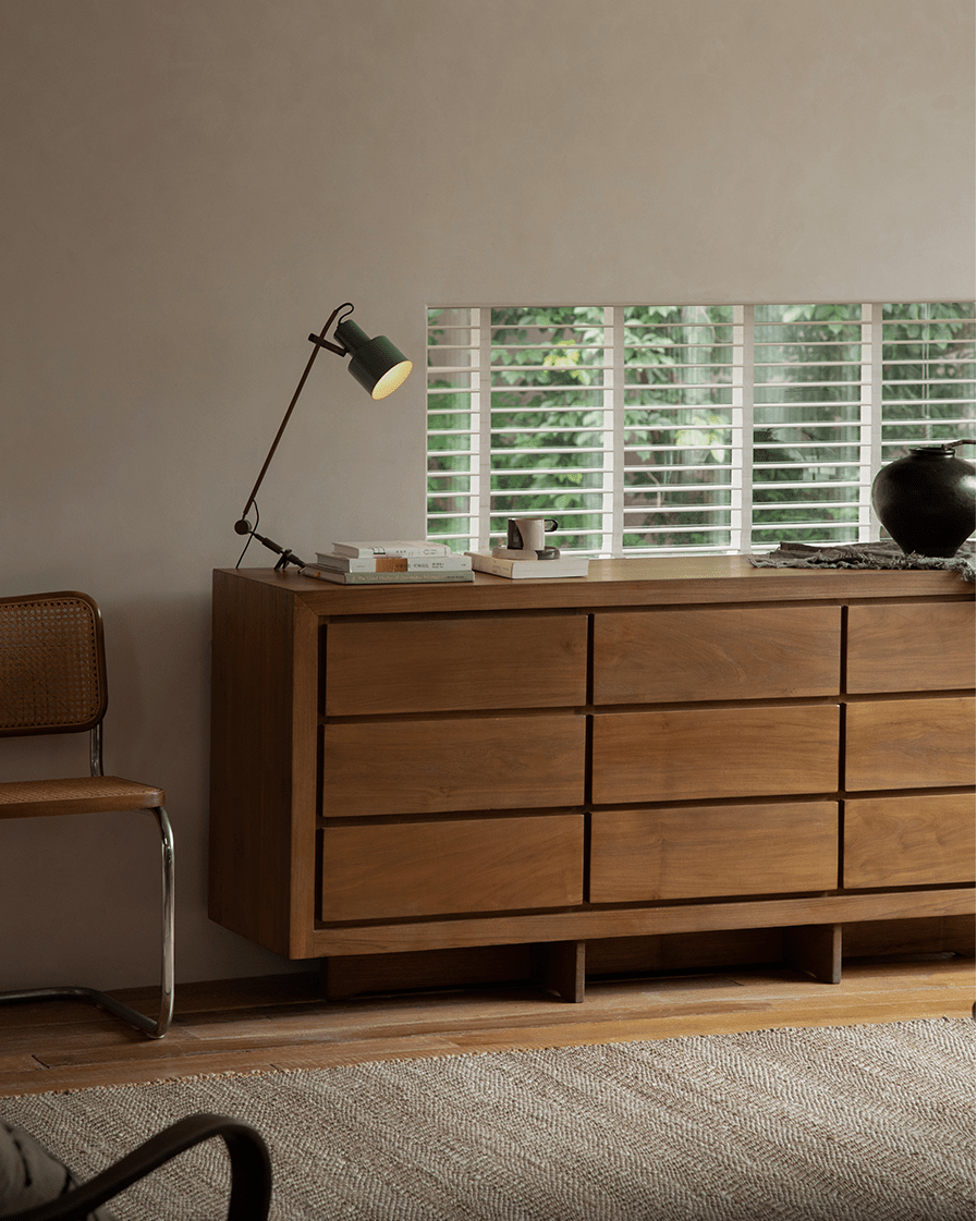 Palette Sideboard in a modern living room setting, crafted from solid teak wood with ample storage and elegant design