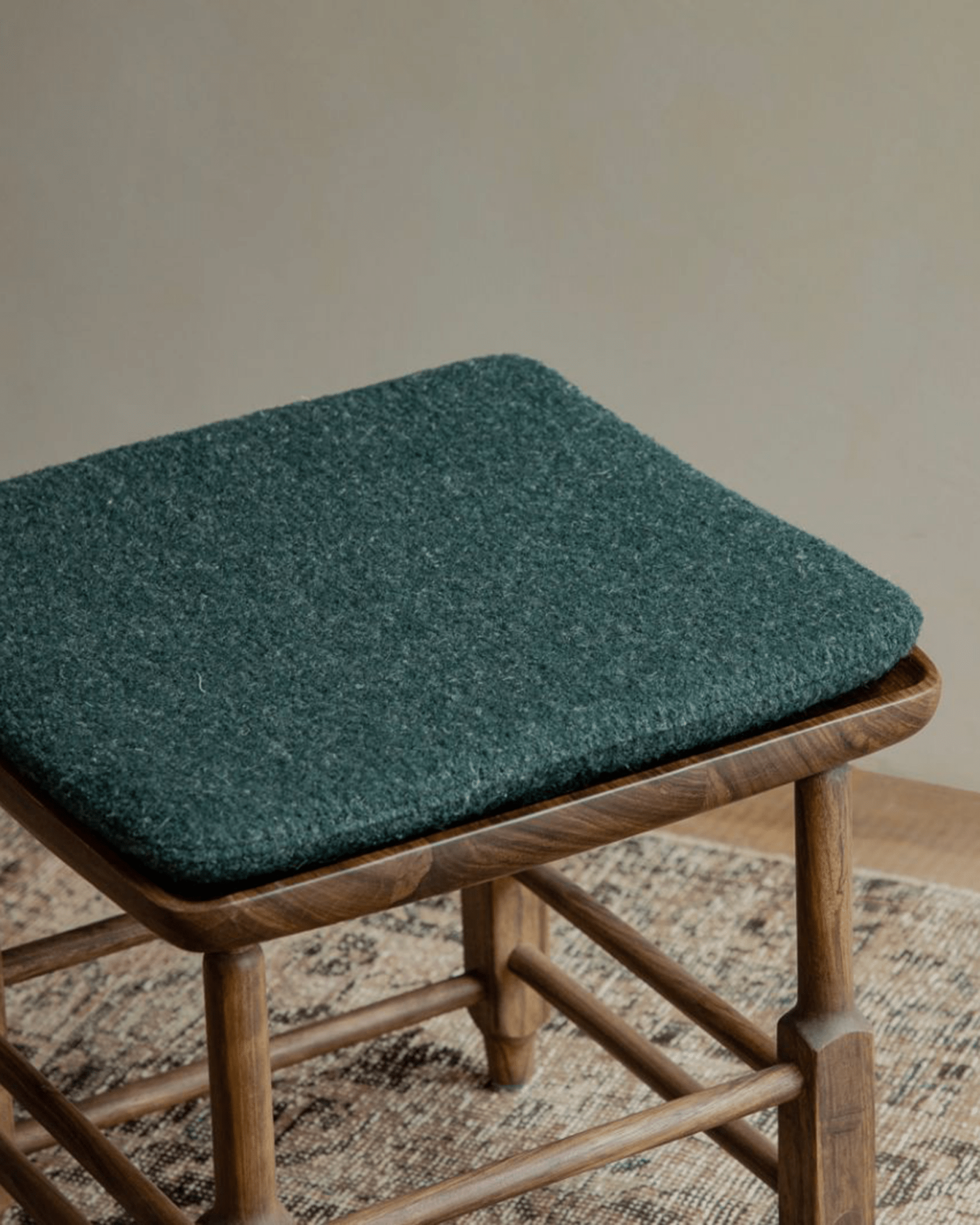 Magrini Stool with green cushion, zebrawood frame