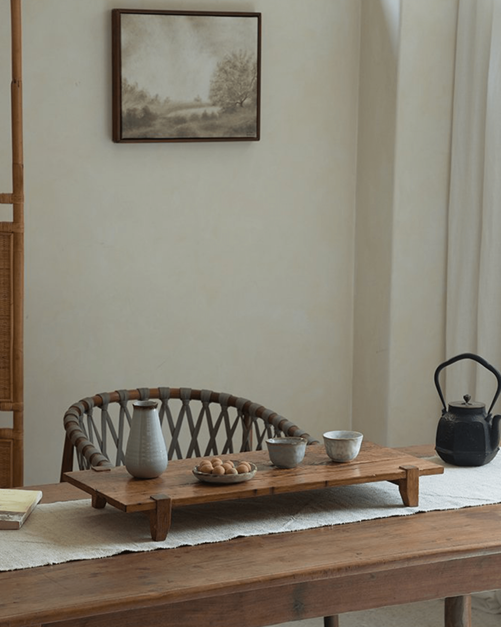 Chinese tea tray made of reclaimed wood, with teapot, cups, and snack, antique design
