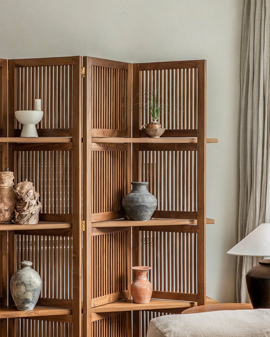 Sylvan Room Divider crafted from Indonesian teak, featuring slatted panels and displaying decorative vases.