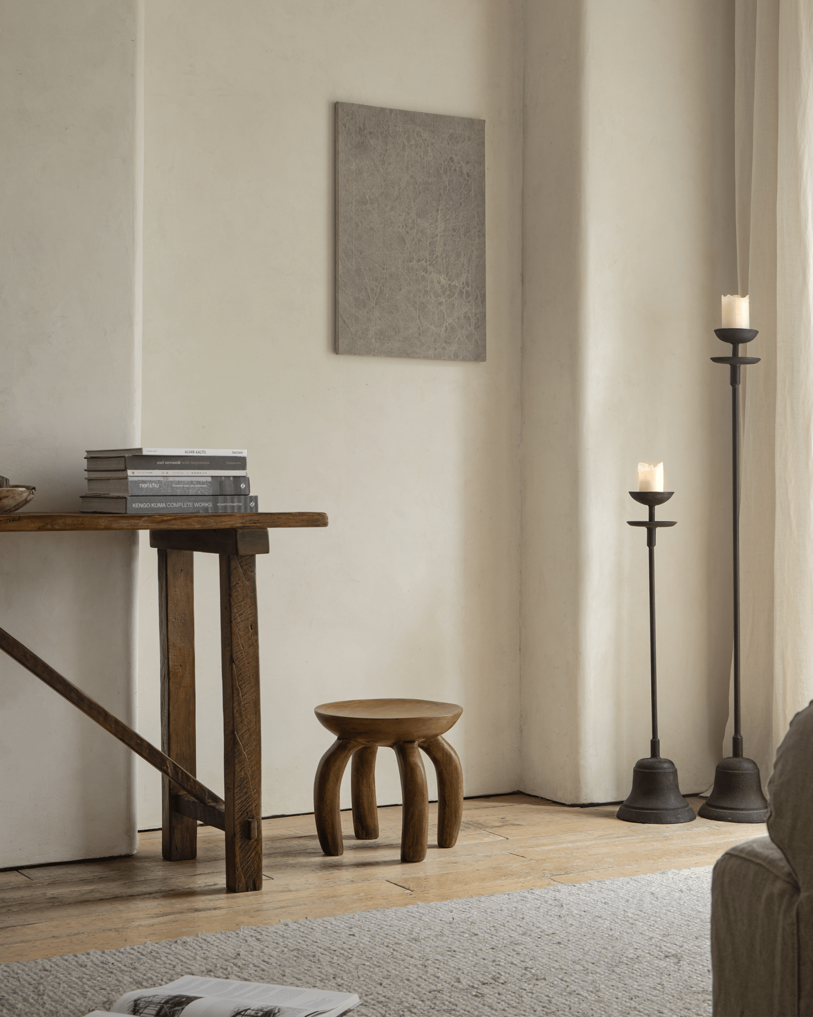 Jelly Stool, solid wood, in elegant living room. Handcrafted sustainable furniture, stylish design.